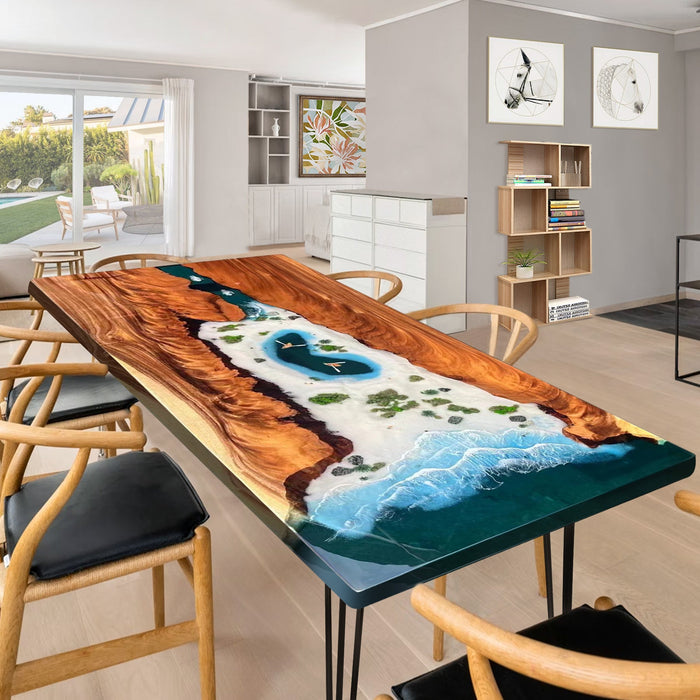 A stunning dining table featuring a resin-crafted ocean landscape design, with wooden edges and surrounded by modern chairs.
