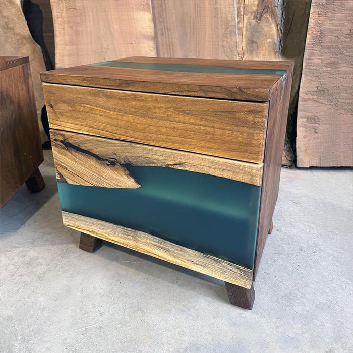 Resin wood bedside table featuring blue epoxy details.