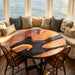 round black walnut dining table with black epoxy resin