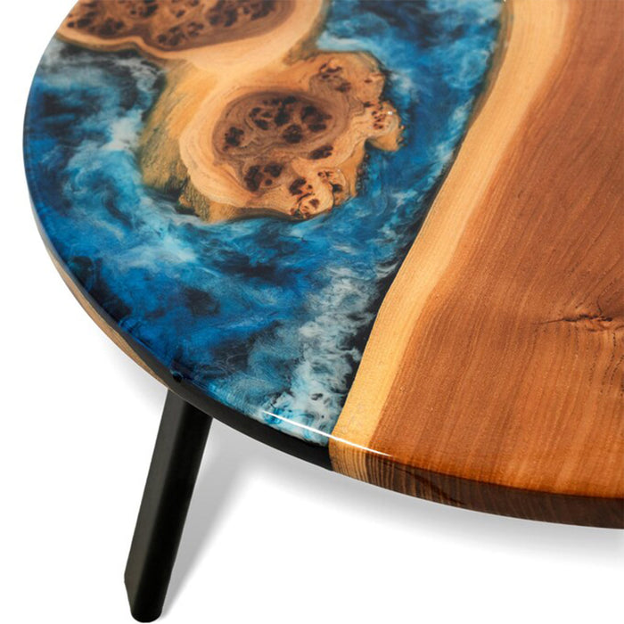 Round epoxy resin table ideal for beach house or ocean view living room