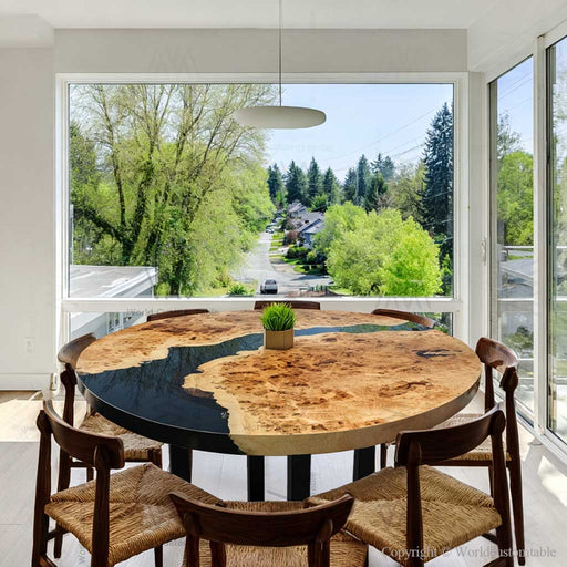 Round poplar epoxy dinning table with black resin in a dining room