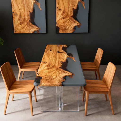 Dining table with wooden finish and clear base, surrounded by matching chairs against a dark wall.