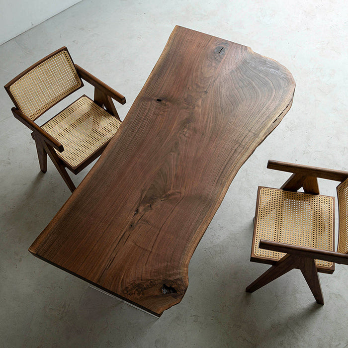 Rustic black walnut live edge table with irregular shape and rich walnut grain