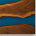 Wooden surface with blue resin inlay