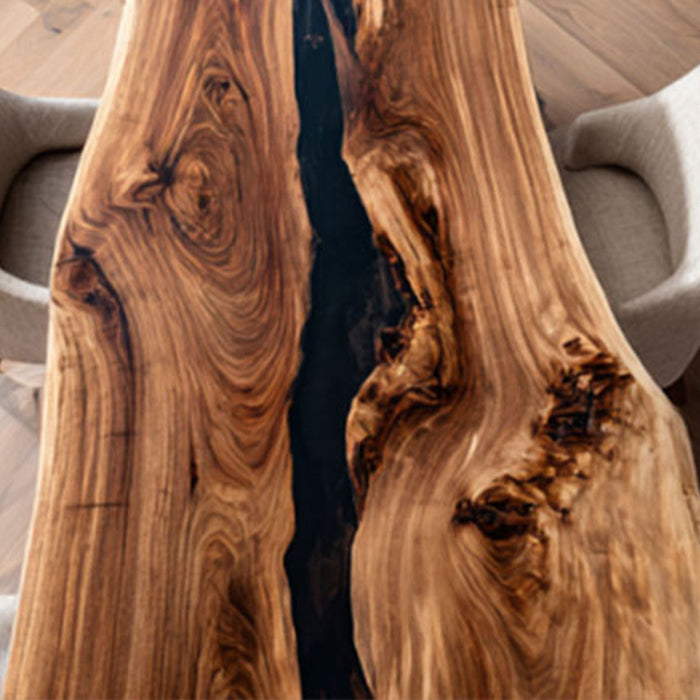 Rustic modern dining room with epoxy river table and live edge design.