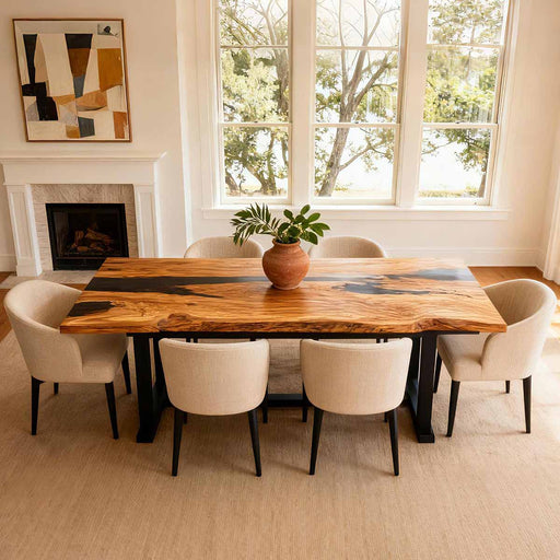 Dining room with a wooden table and chairs near a large window.