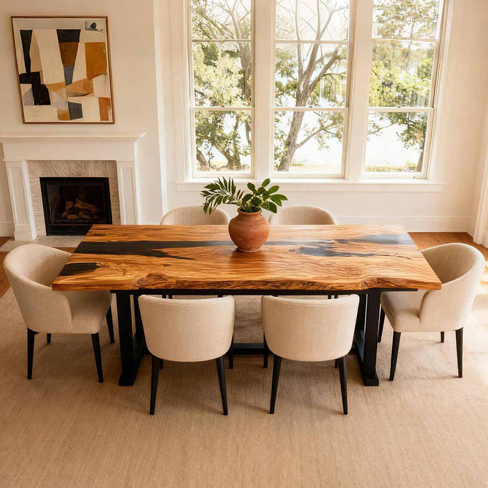Dining room with a wooden table and chairs near a large window.