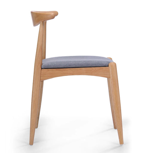 Wooden chair with a gray cushion on a white background