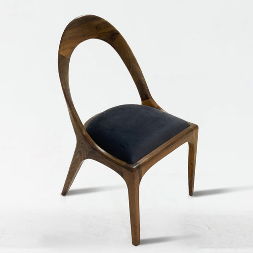 Wooden chair with a black cushion on a white background