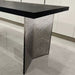 Sculptural clear acrylic leg ideal for resin and wood tabletops in luxury interiors