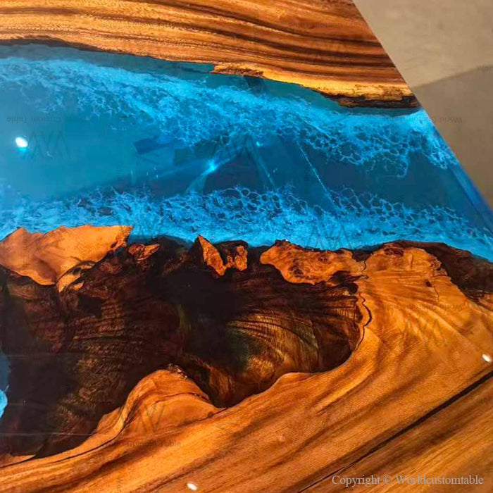 Modern coffee table for a Silicon Valley tech loft, featuring blue epoxy and walnut.