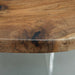 Close-up of a wooden table with a clear resin top