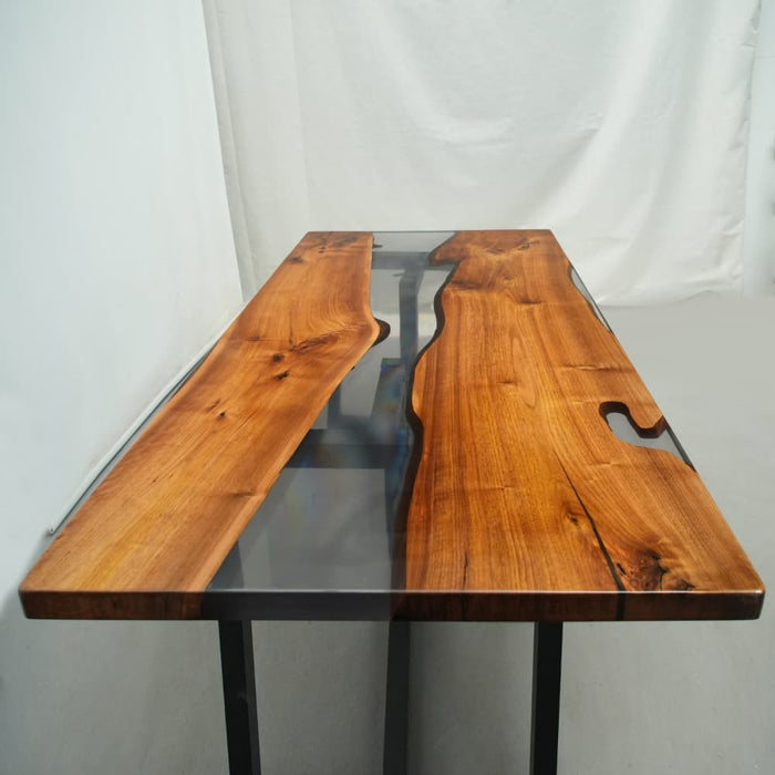 Modern black walnut epoxy dining table with natural wood grain
