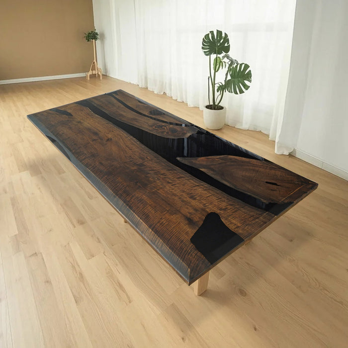Handcrafted solid black walnut epoxy resin table for modern interiors