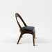 Wooden chair with a black cushion on a white background