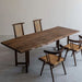 Solid wood black walnut table featuring natural edges and handcrafted details