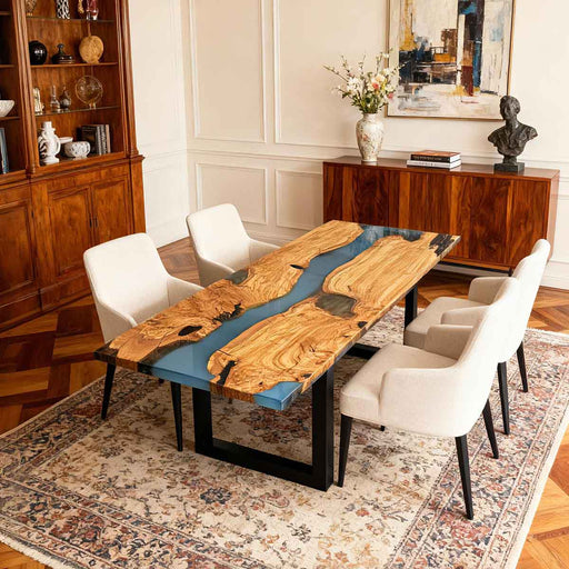 Dining room with a unique wooden table and white chairs.