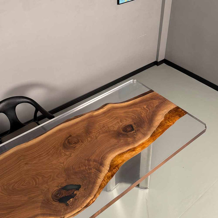 Wooden desk with glass top in a minimalistic office setting