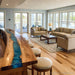 Tropical-inspired walnut bar countertop with clear blue lagoon epoxy, handcrafted long kitchen island slab