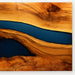 Wooden surface with blue resin flowing through it