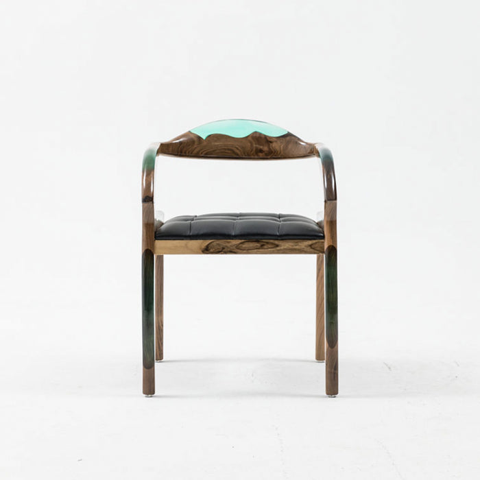 Chair with wooden frame, green backrest, and black seat on a white background