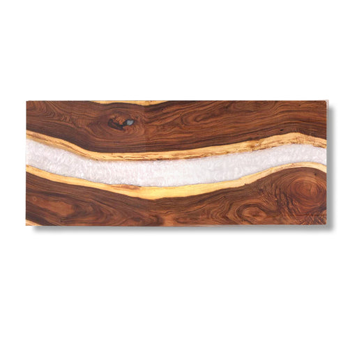 Wooden board with a white resin inlay on a white background
