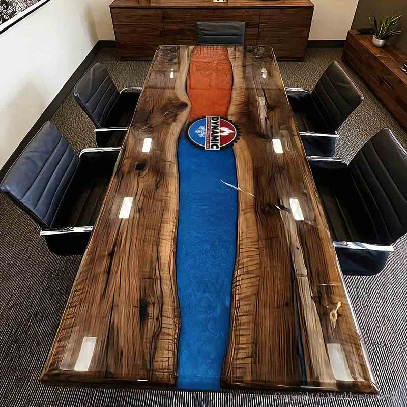 A black walnut ice and fire epoxy conference table placed in a luxury boardroom with modern executive seating.