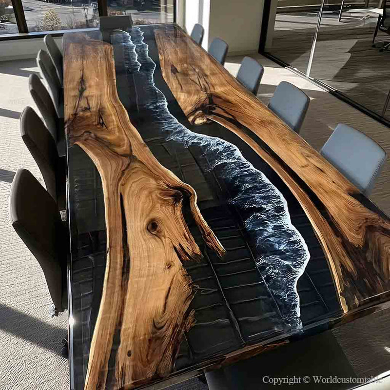 Custom live edge black walnut dining table with striking black epoxy river and realistic ocean wave details.
