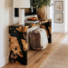 Black burl wood epoxy console table with waterfall edge design for modern entryway decor