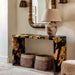 Luxury epoxy console table featuring natural burl wood and black resin finish in a stylish foyer