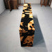 Modern waterfall edge console table crafted with burl wood and black epoxy resin