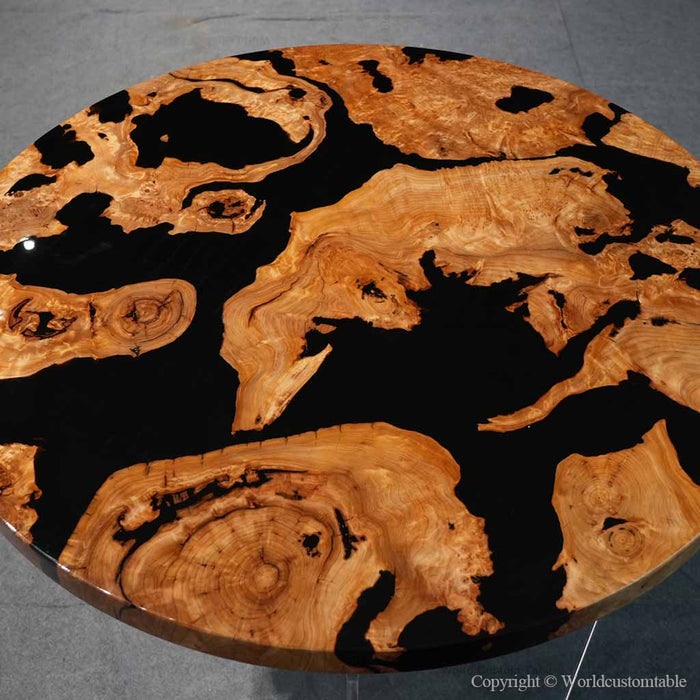 Modern black epoxy river table with unique burl wood texture for contemporary interiors