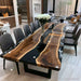 Modern custom live edge walnut epoxy table designed with premium hardwood, natural edges, and durable black resin.