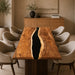 Large walnut dining table with deep black epoxy resin