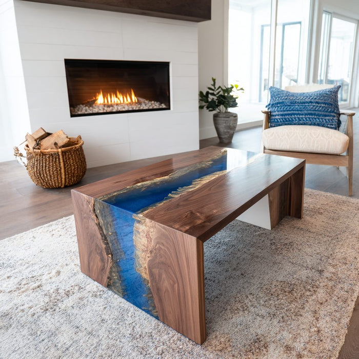 Handcrafted walnut blue epoxy waterfall table with natural wood grain.