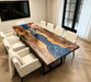 Live edge walnut table with blue swirl epoxy river design