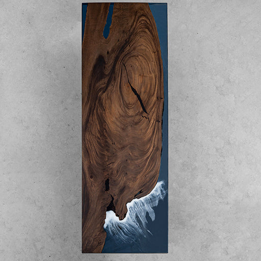 Walnut wood epoxy river table with stunning blue waves resin finish.