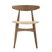 Wooden side table with a round top and curved shelf on a white background