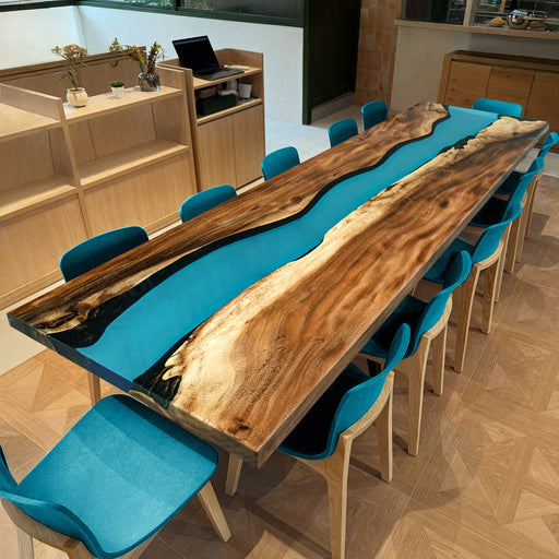 Executive boardroom table featuring walnut and glossy epoxy.