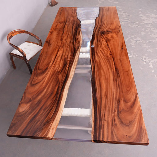Walnut epoxy dining table measuring 60 by 144 inches with clear resin finish