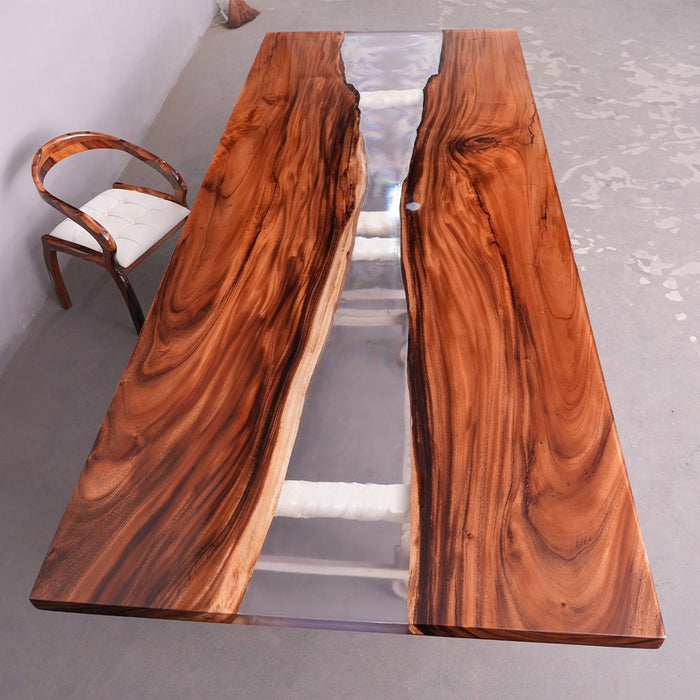Walnut epoxy dining table measuring 60 by 144 inches with clear resin finish