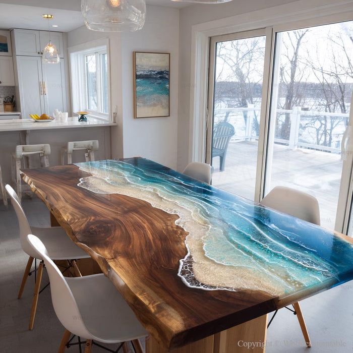 Artistic walnut epoxy table showcasing ocean-blue resin, flowing waves, and a smooth sand beach pattern.