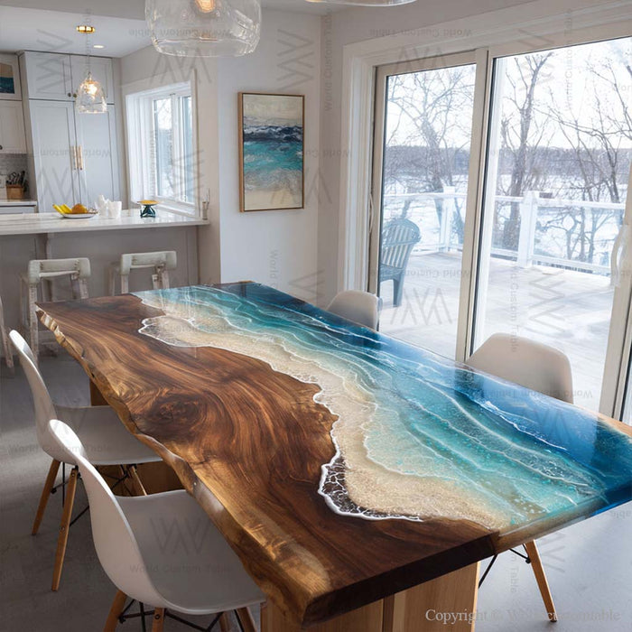 Artistic walnut epoxy table showcasing ocean-blue resin, flowing waves, and a smooth sand beach pattern.