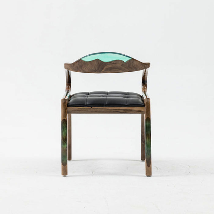 Chair with wooden frame and black cushion on a white background