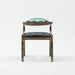 Chair with wooden frame and black cushion on a white background