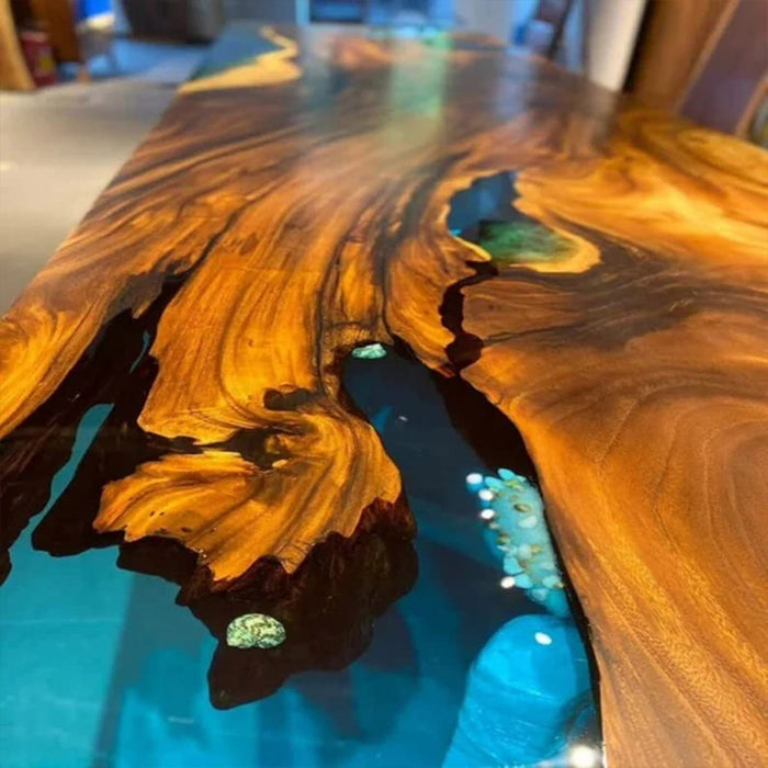 Wooden table with a blue resin inlay
