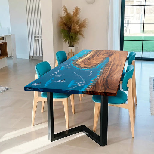 Custom walnut river dining table with deep blue epoxy