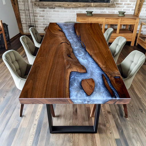 Luxury walnut wood river table with pearl white epoxy center, styled for a modern dining room.