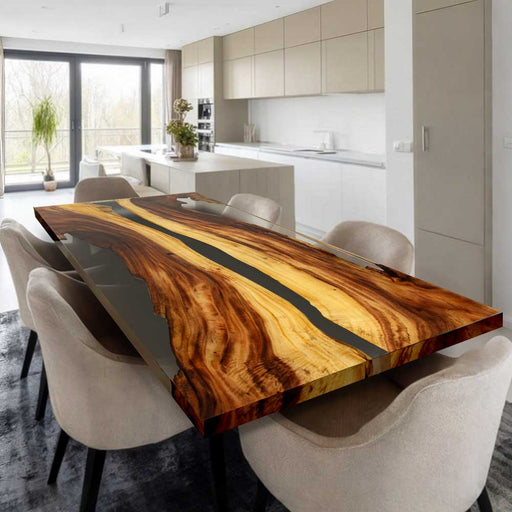 Close-up of walnut wood grain and transparent epoxy resin craftsmanship