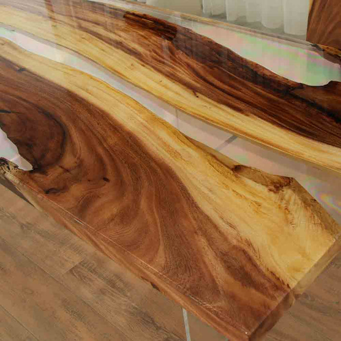 Close-up highlighting natural walnut texture and crystal-clear epoxy resin